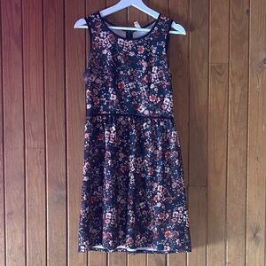 Black Dress with Red and Blue Floral Design